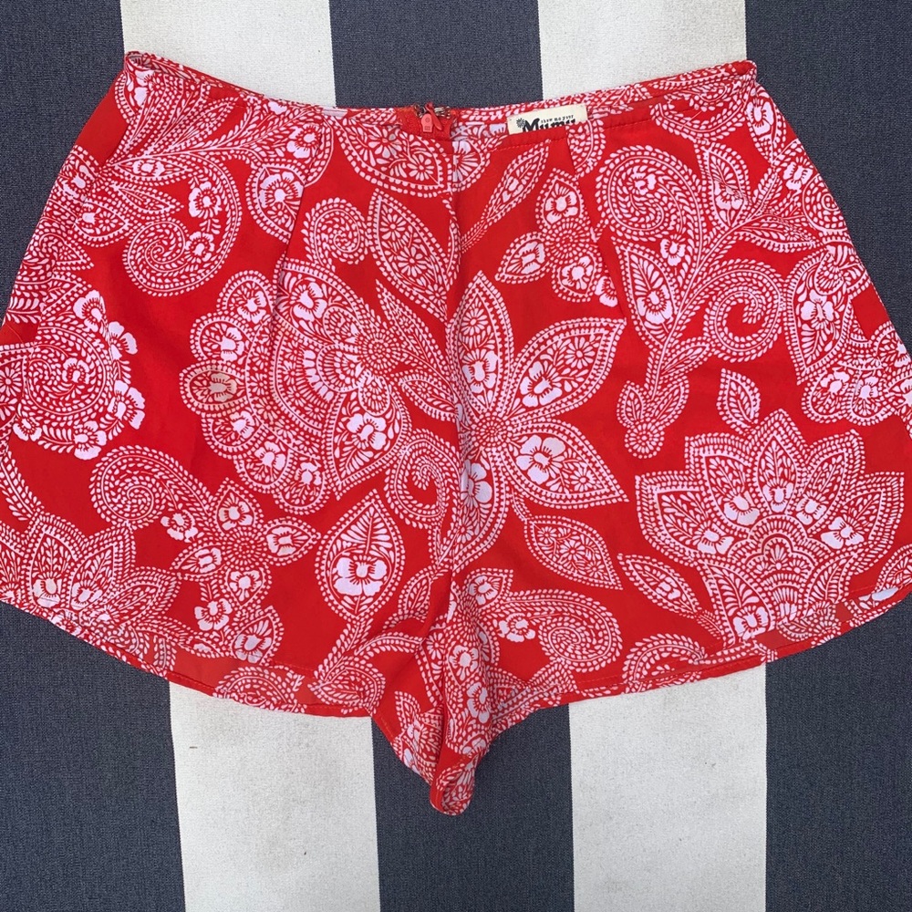 patterned red shorts